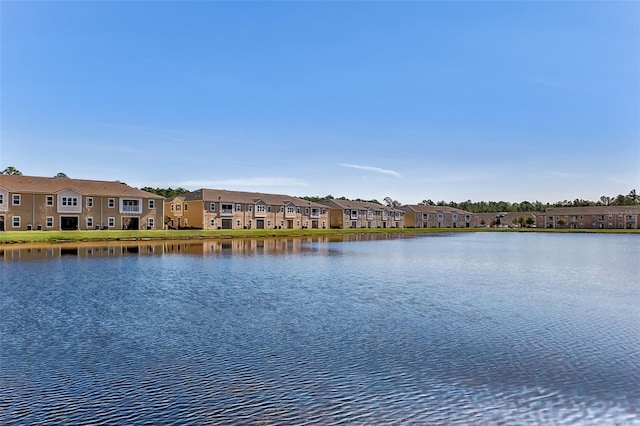 view of water feature with a residential view