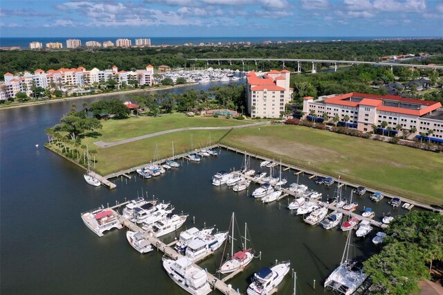 birds eye view of property featuring a water view