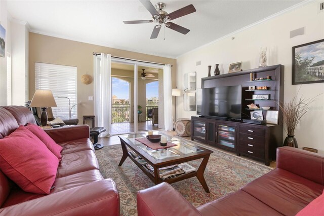 living room featuring ceiling fan, crown molding, and hardwood / wood-style floors