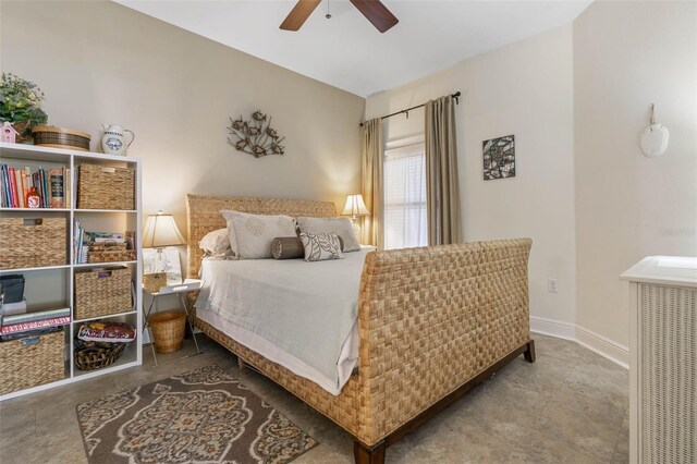 bedroom featuring tile patterned floors and ceiling fan