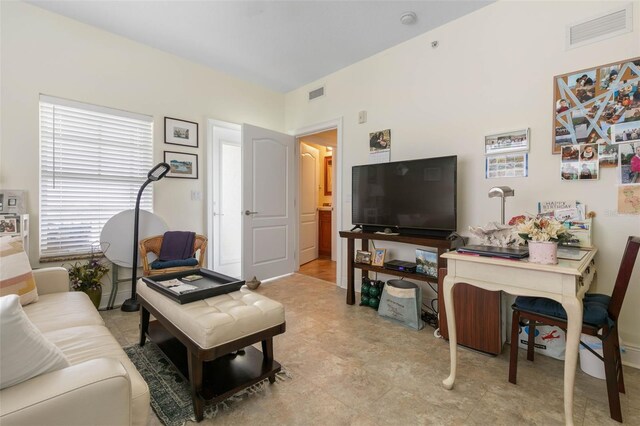 living room with light tile patterned floors