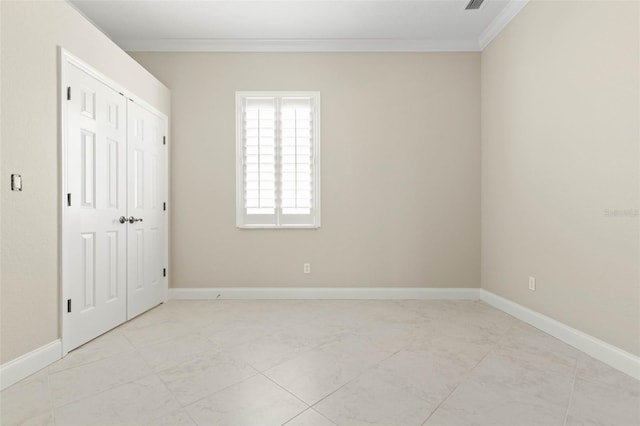 unfurnished bedroom with crown molding