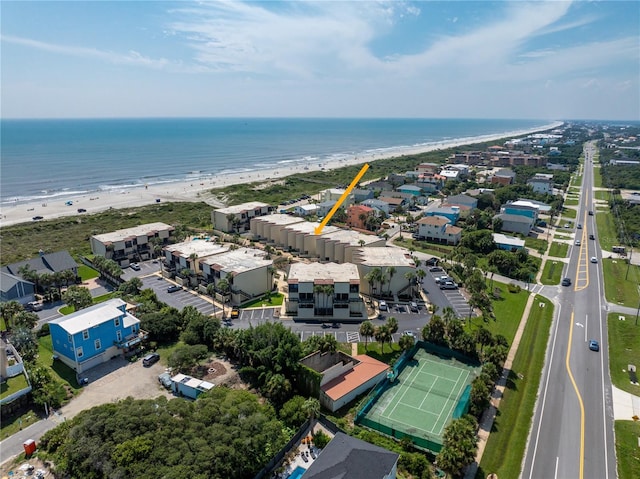 drone / aerial view with a view of the beach and a water view