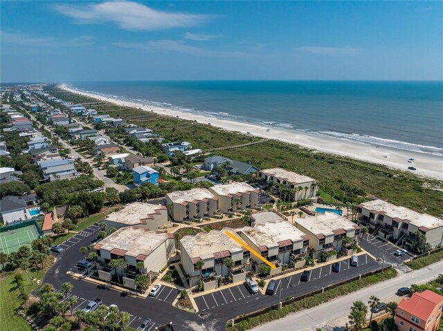 birds eye view of property featuring a view of the beach and a water view