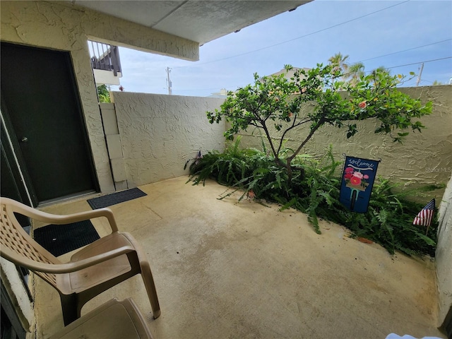 view of patio with fence