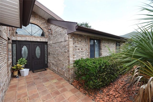 entrance to property featuring french doors