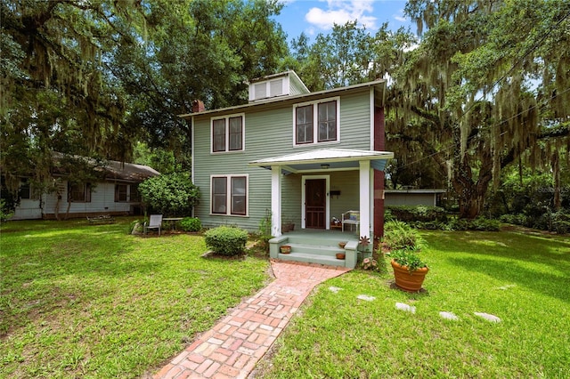 view of front facade with a front lawn