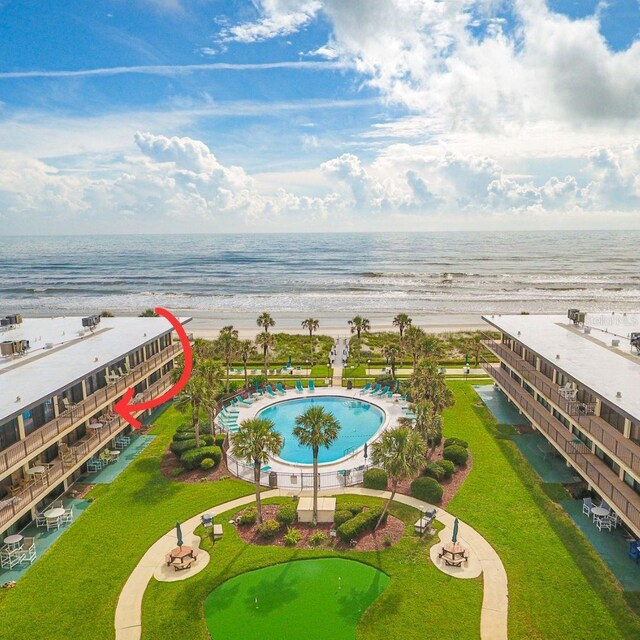 bird's eye view with a view of the beach and a water view