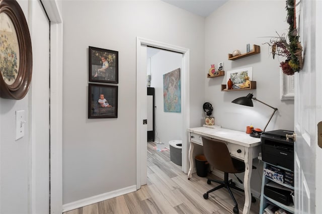 office featuring light wood finished floors and baseboards