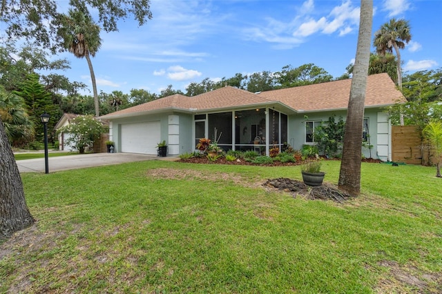 ranch-style home with stucco siding, a sunroom, a garage, driveway, and a front lawn