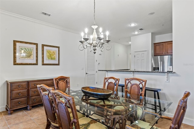 tiled dining room with crown molding and a chandelier