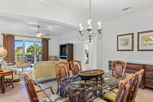 dining space with ceiling fan with notable chandelier, ornamental molding, and light tile patterned floors