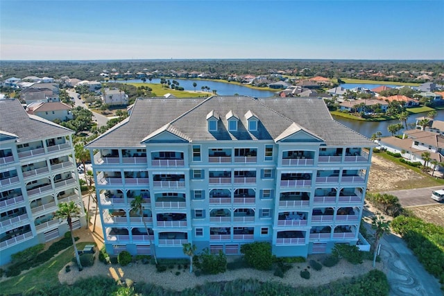 drone / aerial view with a water view