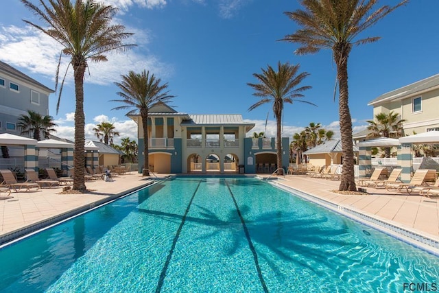 view of pool with a patio area