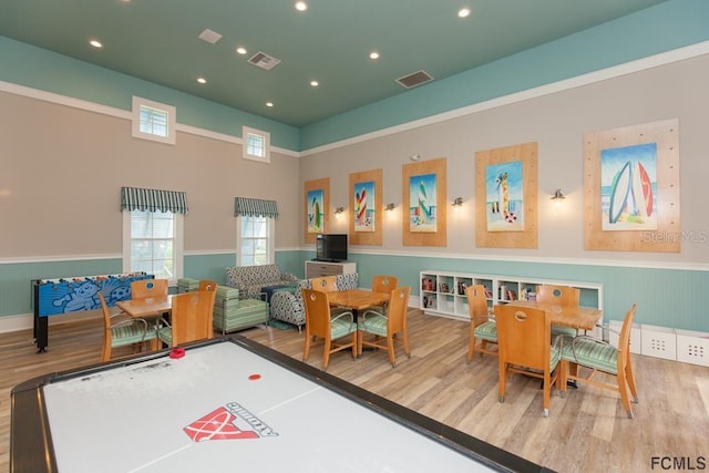 recreation room with hardwood / wood-style flooring