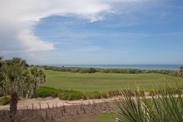 exterior space featuring a water view and a yard