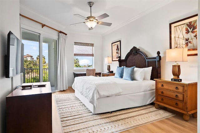 200 Cinnamon Beach Way Unit 122, Palm Coast, FL 32137 - bedroom with light wood-style floors, access to exterior, crown molding, and ceiling fan