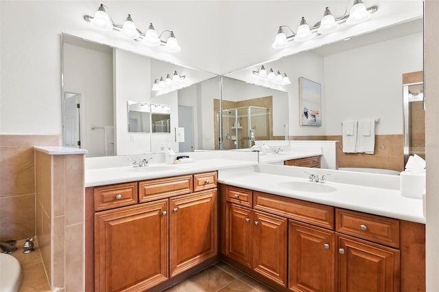 200 Cinnamon Beach Way Unit 122, Palm Coast, FL 32137 - full bath featuring a stall shower, tile patterned flooring, double vanity, and a tub to relax in