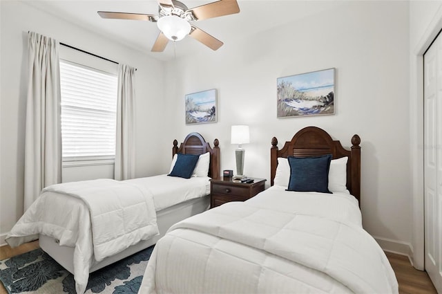 200 Cinnamon Beach Way Unit 122, Palm Coast, FL 32137 - bedroom featuring wood finished floors, baseboards, a closet, and ceiling fan