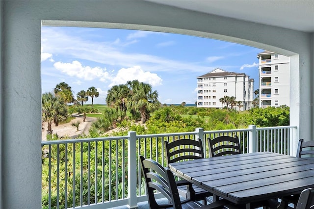 200 Cinnamon Beach Way Unit 122, Palm Coast, FL 32137 - balcony with outdoor dining area