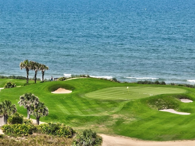 200 Cinnamon Beach Way Unit 122, Palm Coast, FL 32137 - view of property's community featuring golf course view, a putting green, and a water view