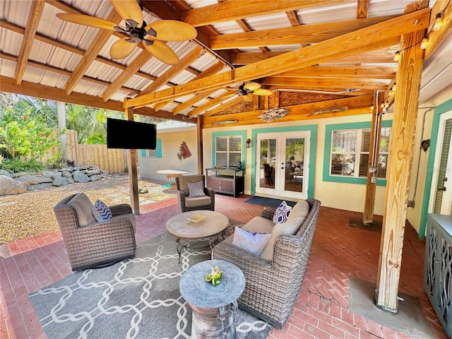 view of patio / terrace with ceiling fan and french doors