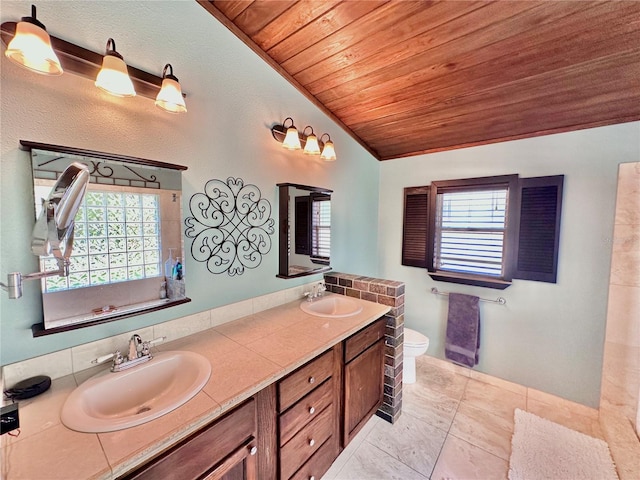 bathroom featuring wooden ceiling, toilet, tile patterned floors, lofted ceiling, and dual vanity