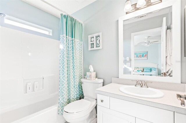 full bathroom with vanity, ceiling fan, toilet, and shower / bath combination with curtain