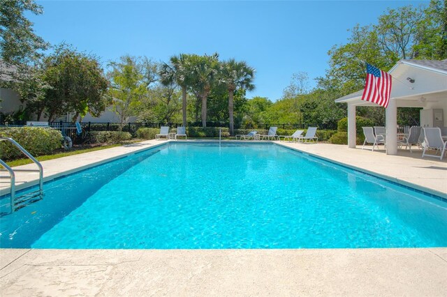 view of pool featuring a patio area