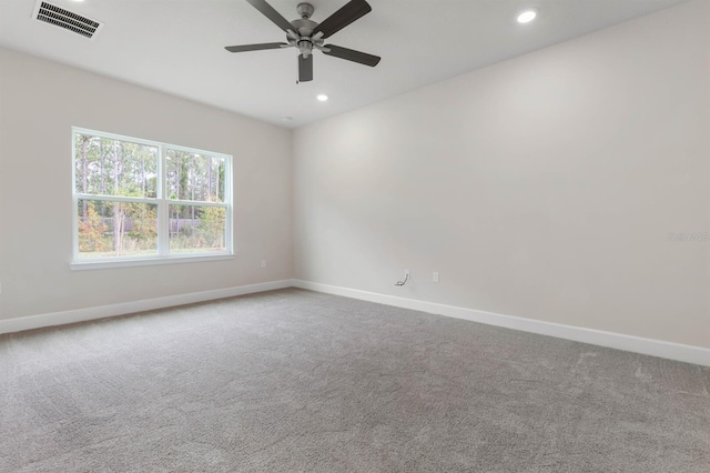 unfurnished room featuring carpet flooring and ceiling fan