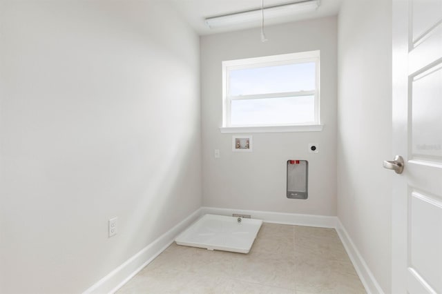 clothes washing area with hookup for a washing machine and electric dryer hookup