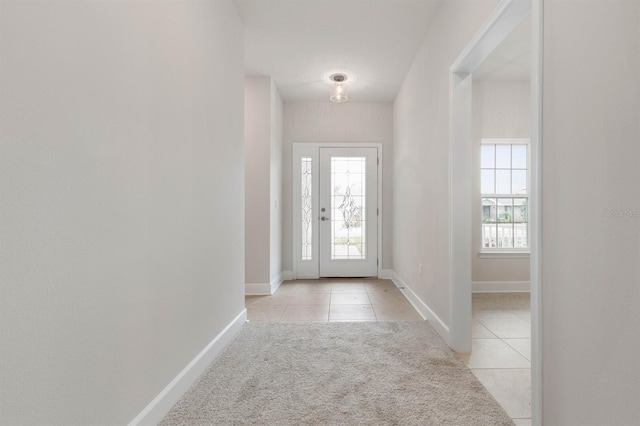 entrance foyer featuring light tile patterned floors