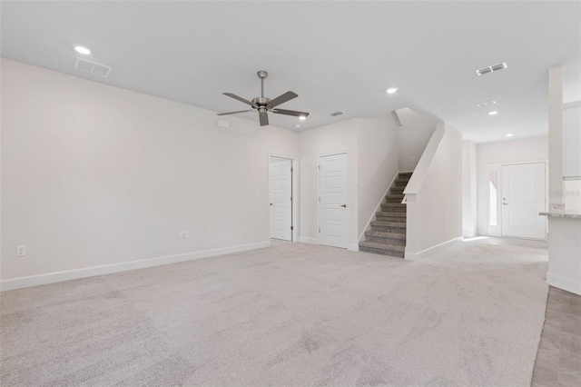 unfurnished living room with visible vents, recessed lighting, and ceiling fan