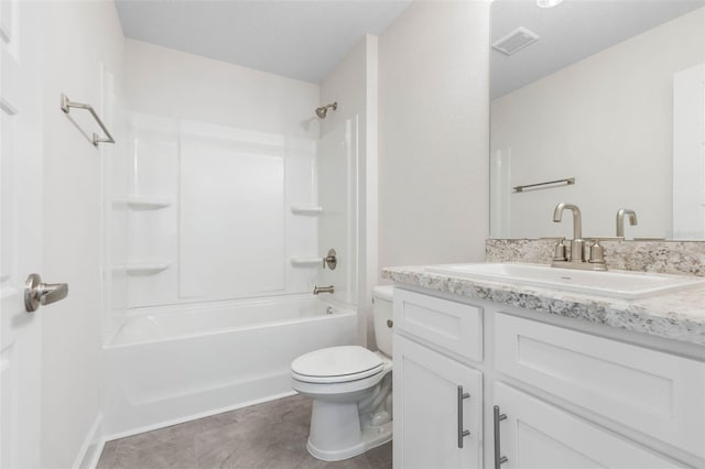 bathroom featuring tile patterned floors, visible vents, toilet, bathtub / shower combination, and vanity