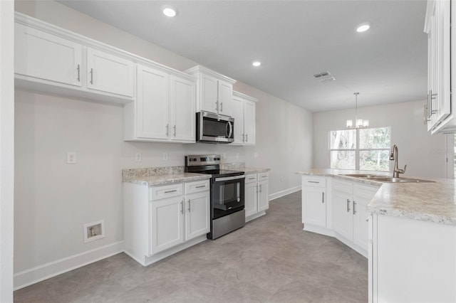 kitchen with visible vents, a sink, white cabinetry, recessed lighting, and appliances with stainless steel finishes