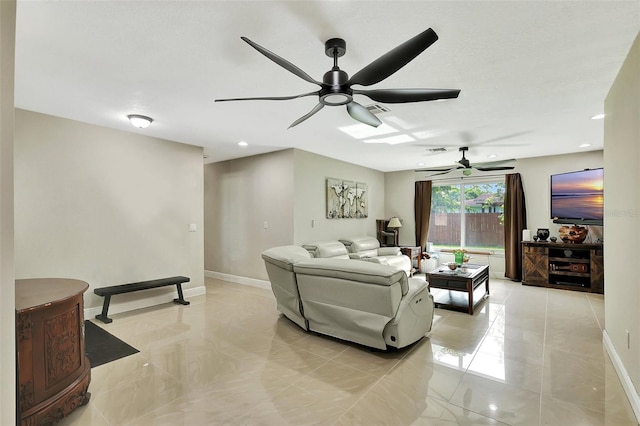 living room with ceiling fan