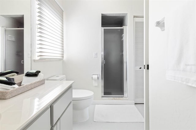 full bath with a closet and a shower stall