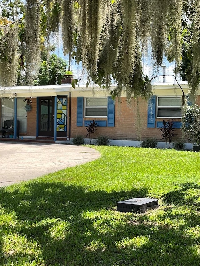 view of front of home with a front yard