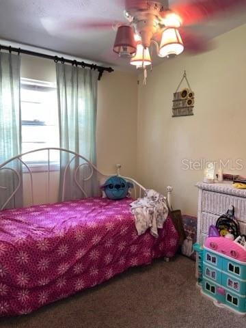 bedroom with carpet floors and ceiling fan