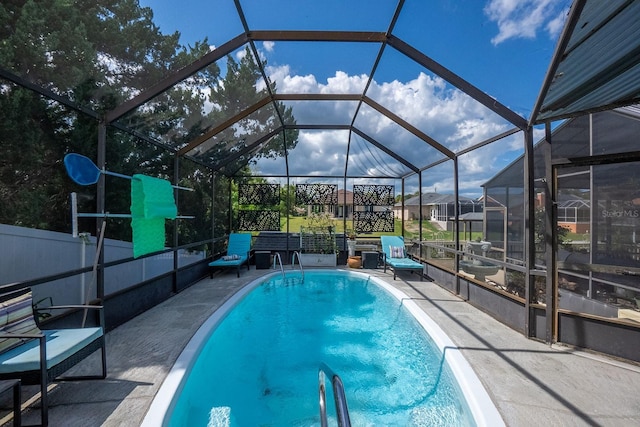 pool featuring a patio area and a lanai