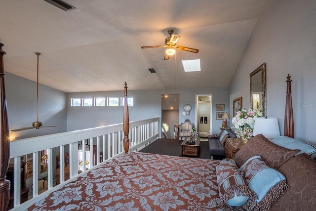 bedroom featuring vaulted ceiling and visible vents