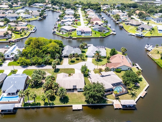 aerial view with a water view and a residential view