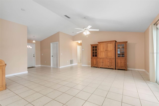 interior space featuring high vaulted ceiling, ceiling fan, and light tile patterned floors