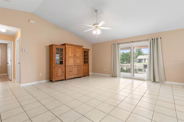 unfurnished room with light tile patterned flooring, ceiling fan, and high vaulted ceiling