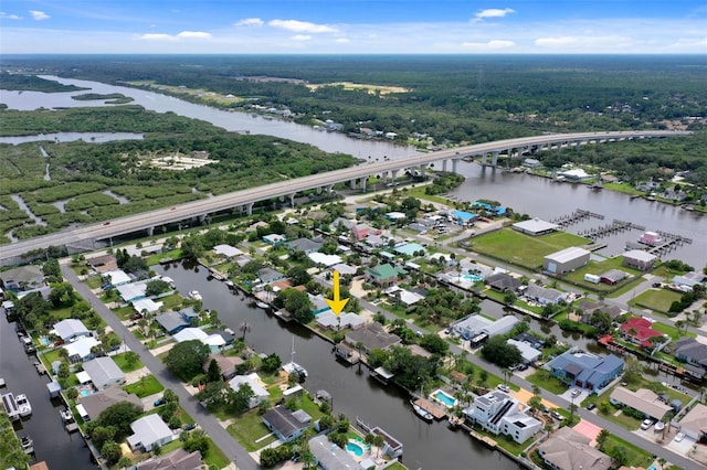 birds eye view of property featuring a water view