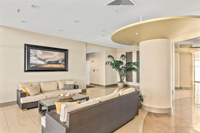 living room with light tile patterned floors