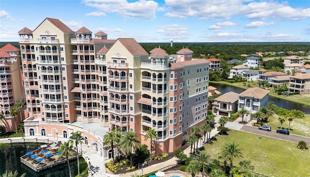 view of building exterior featuring a water view