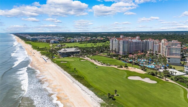 drone / aerial view with a view of the beach and a water view