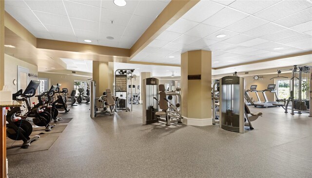 workout area featuring a paneled ceiling