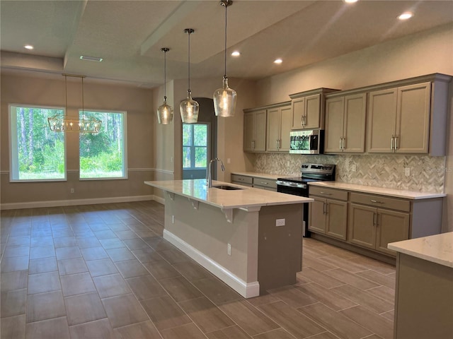 201 Hawthorn Ave, Palm Coast, FL 32164 - kitchen featuring appliances with stainless steel finishes, a sink, backsplash, recessed lighting, and gray cabinetry